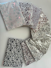 Load image into Gallery viewer, One-piece Lycra hijab with multiple patterns(حجاب رياضي قطعة واحدة ليكرا بنقوشات والوان مختلفة)
